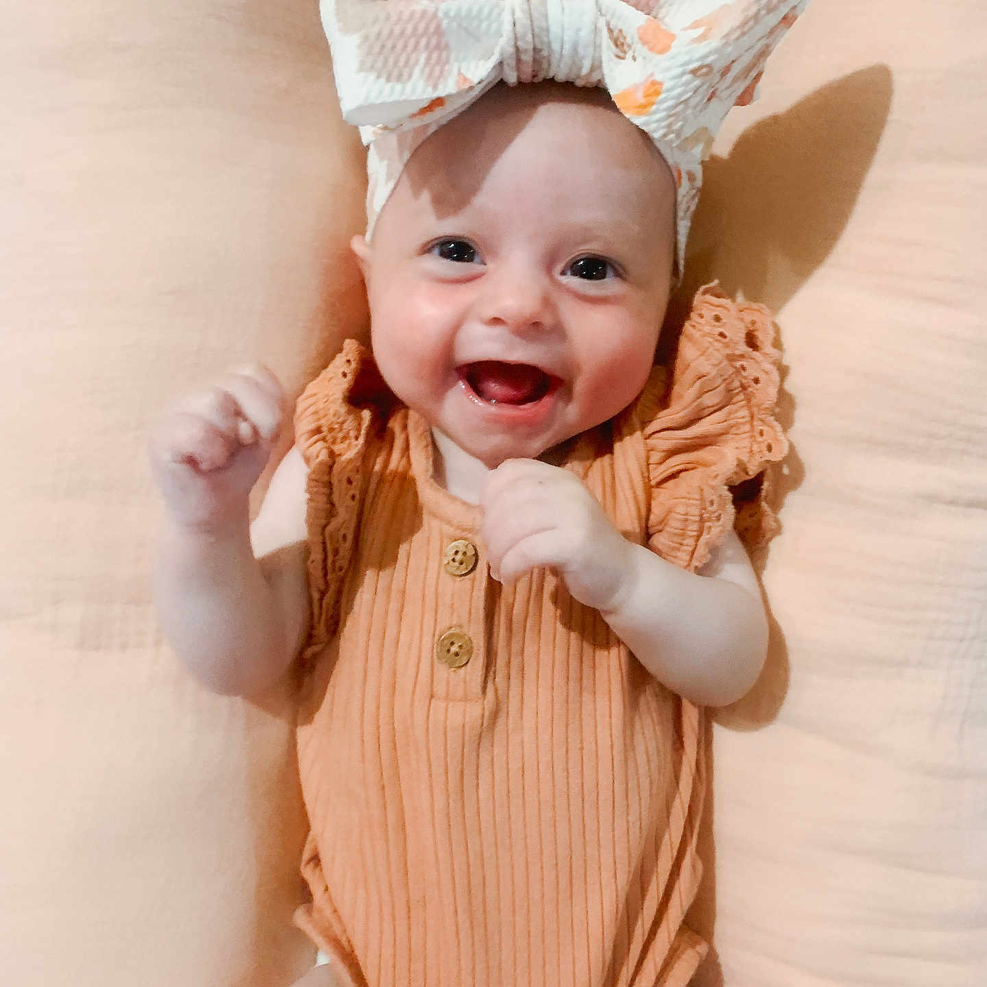 Harlowe joined the competition — help win amazing prizes! baby, babylaughing, bonnet, clothing, diaper, face, happy, hat, head, laughing, person, photography, portrait, smile