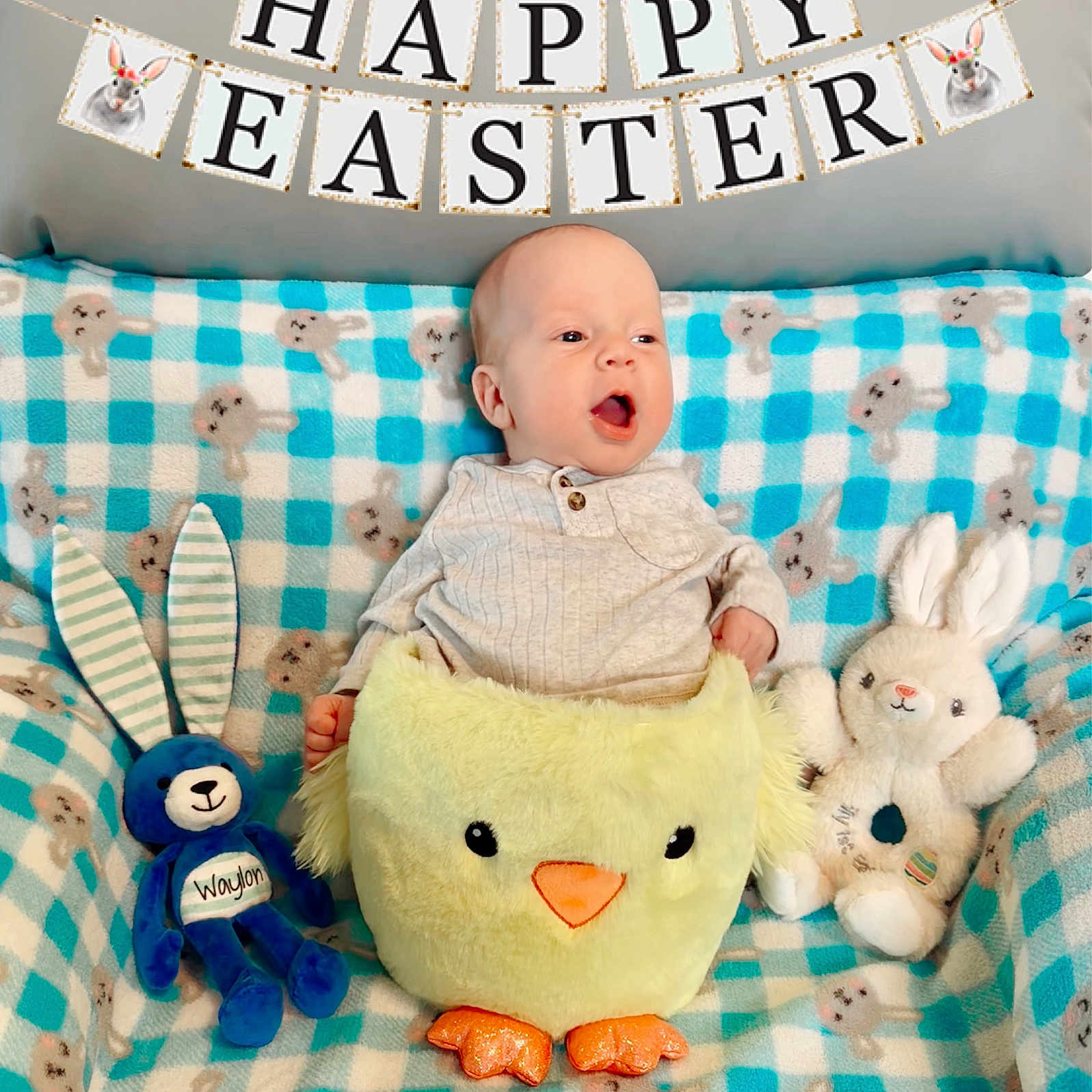 Waylon is registered to the contest to win money with this photo: baby, babylaughing, blanket, crib, face, furniture, happy, head, infantbed, person, plush, toy, yawning