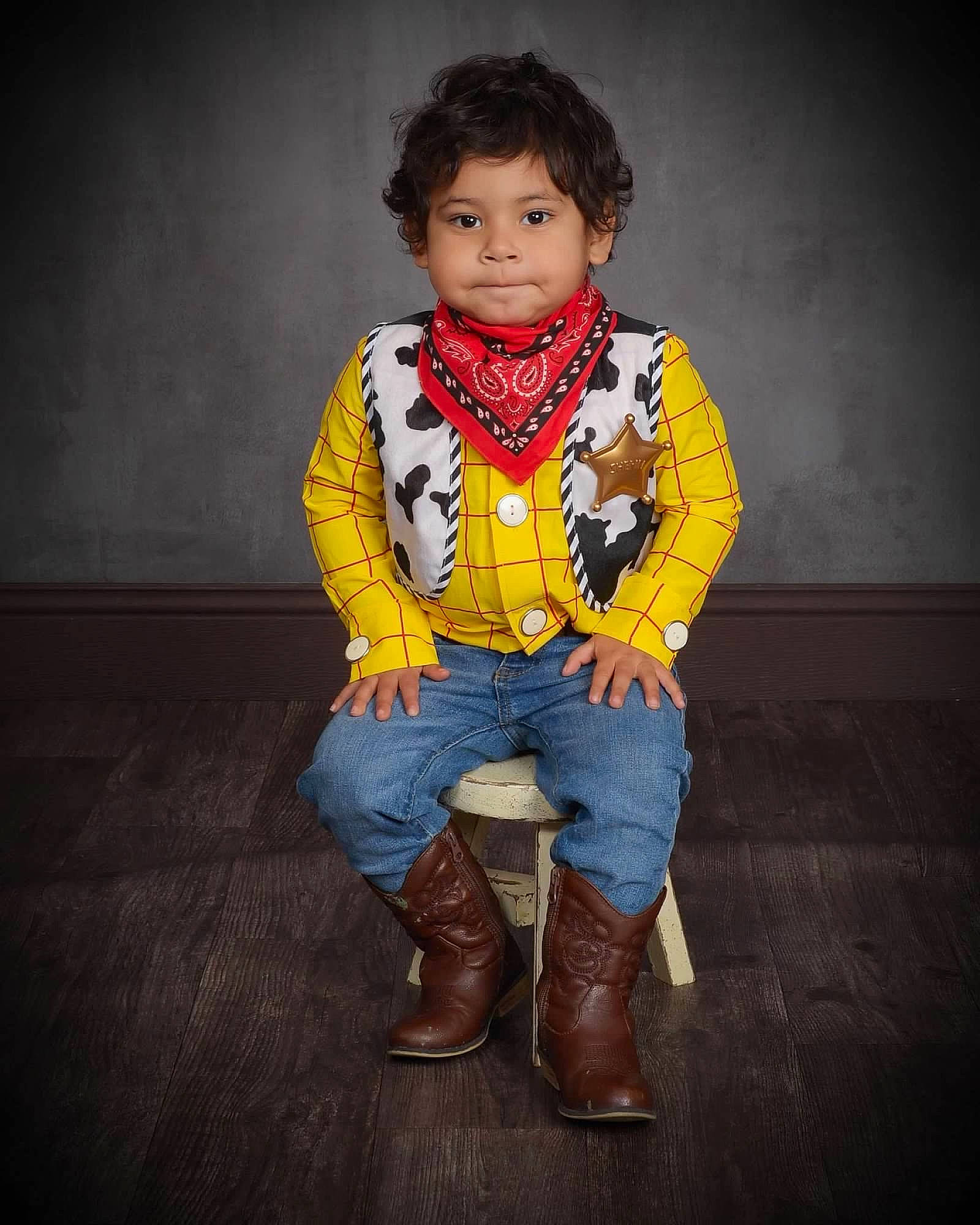 Benjamin is registered to the contest to win money with this photo: baby_toddler_clothing, collar, denim, dress_shirt, electric_blue, face, fashion_accessory, fashion_design, flash_photography, fur, hair, hat, human_body, jewellery, pattern, person, personal_protective_equipment, scarf, sitting, sleeve