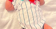 Amir joined the competition — help win amazing prizes! baby, newborn, pacifier, hat, mittens, socks, onesie, striped_clothing, red_color, white_blanket, sleeping, infant, cute, soft_texture, lying_down, cozy, small_person, child, indoor, portrait