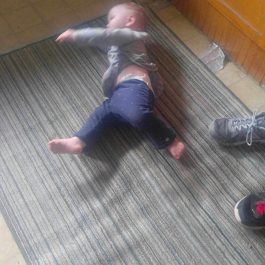 Oliva is registered to the contest to win money with this photo: angle, floor, flooring, fun, girl, hardwood, laminate_flooring, leg, wood, wood_flooring