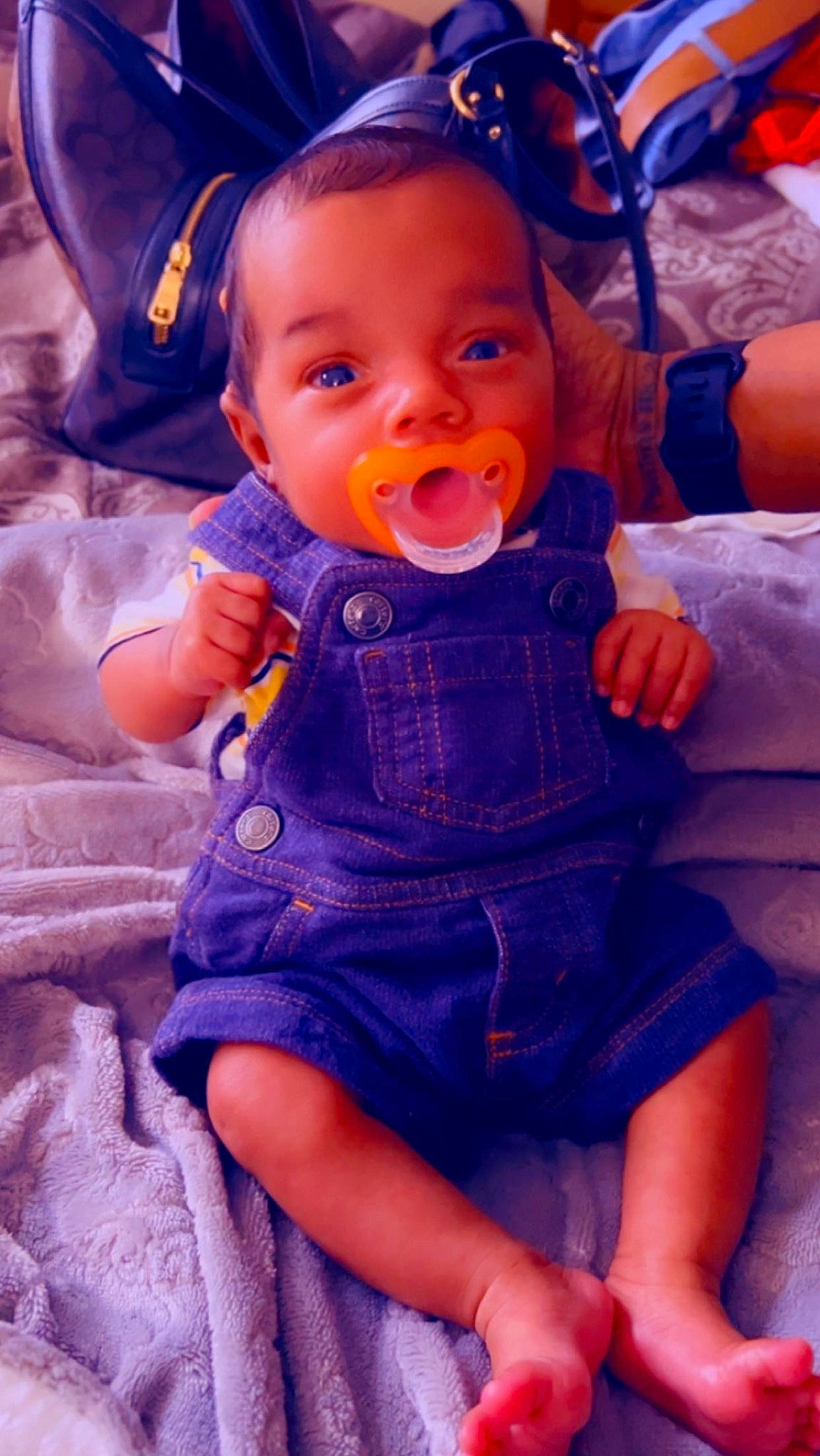 Carson joined the competition — help win amazing prizes! baby, baby_products, baby_toddler_clothing, cheek, child, electric_blue, face, fun, happy, head, iris, lip, mouth, nose, orange, person, pink, purple, skin, sleeve