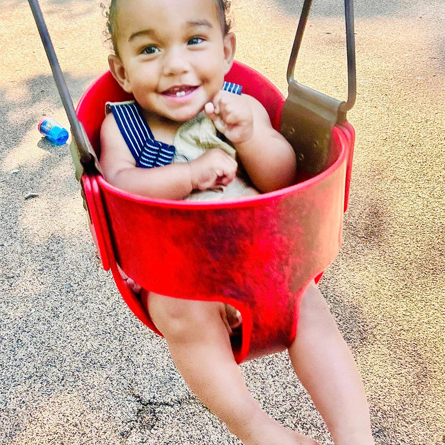 Carson is registered to the contest to win money with this photo: baby, city, clothing, face, grass, head, nature, outdoorplayarea, outdoors, park, person, photography, plant, playarea, portrait, road, street, summer, toy, urban