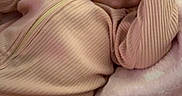 Kaylani joined the competition — help win amazing prizes! baby, blanket, child, comfort, cozy, cute, face, fingers, hand, happy, indoors, infant, lying_down, pink, relaxing, sleepwear, smile, soft, warm, zipped_jumpsuit