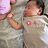 Kaylani joined the competition — help win amazing prizes! baby, blanket, child, cozy, cute, fabric, face, hand, indoor, infant, lying_down, onesie, peaceful, pink, plush_toy, portrait, rest, sleeping, soft_texture, young