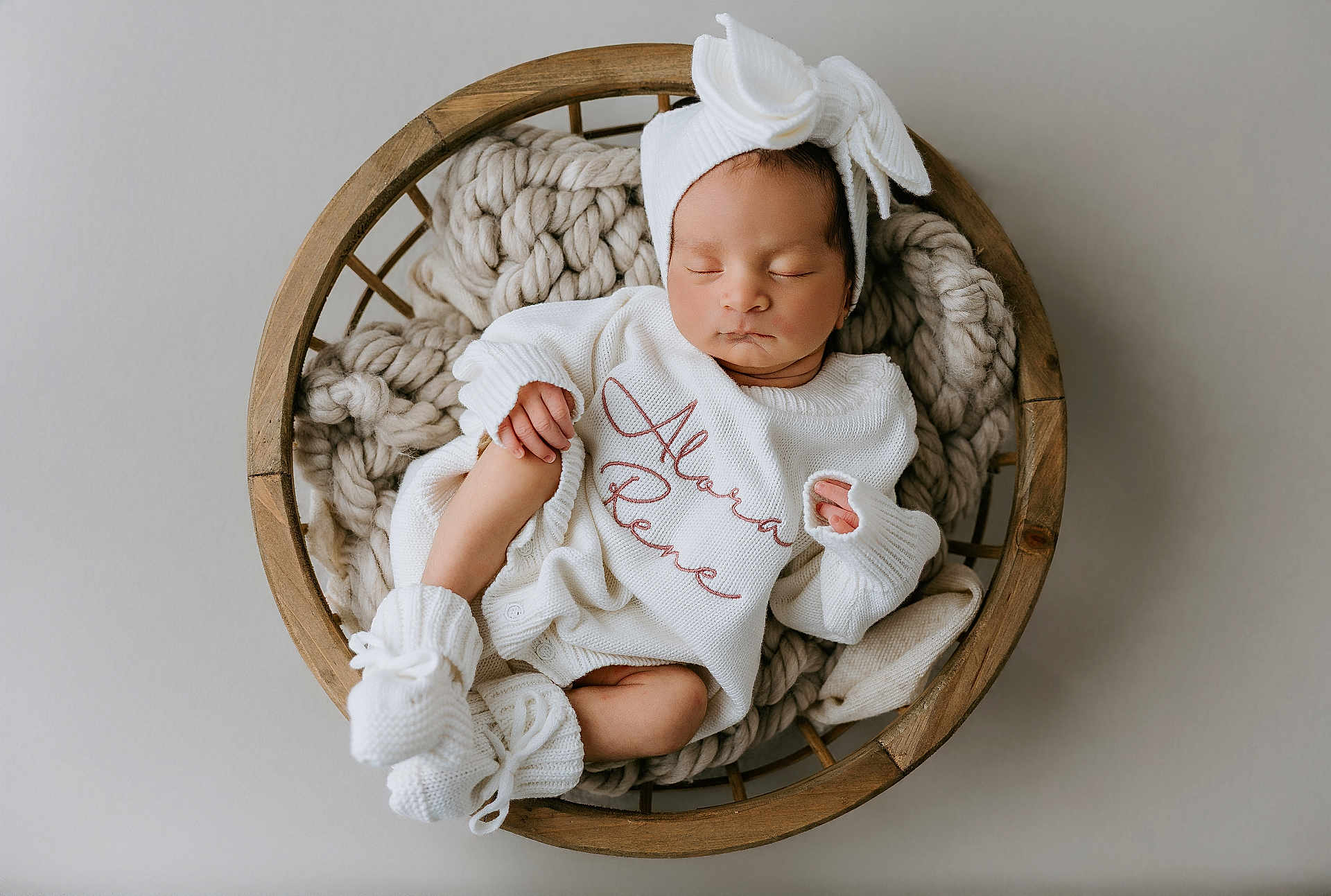 Alora-Rene joined the competition — help win amazing prizes! baby, basket, blanket, bow, cozy, cute, headband, indoors, infant, knitwear, newborn, peaceful, portrait, resting, sleeping, small_feet, small_hands, soft_lighting, white_clothing, wooden_basket