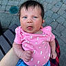 Aurora joined the competition — help win amazing prizes! baby, child, infant, pink_shirt, blue_shorts, tongue_out, hand, face, skin, person, outdoor, pavement, bench, holding, cute, expression, short_hair, clothing, summer, daylight