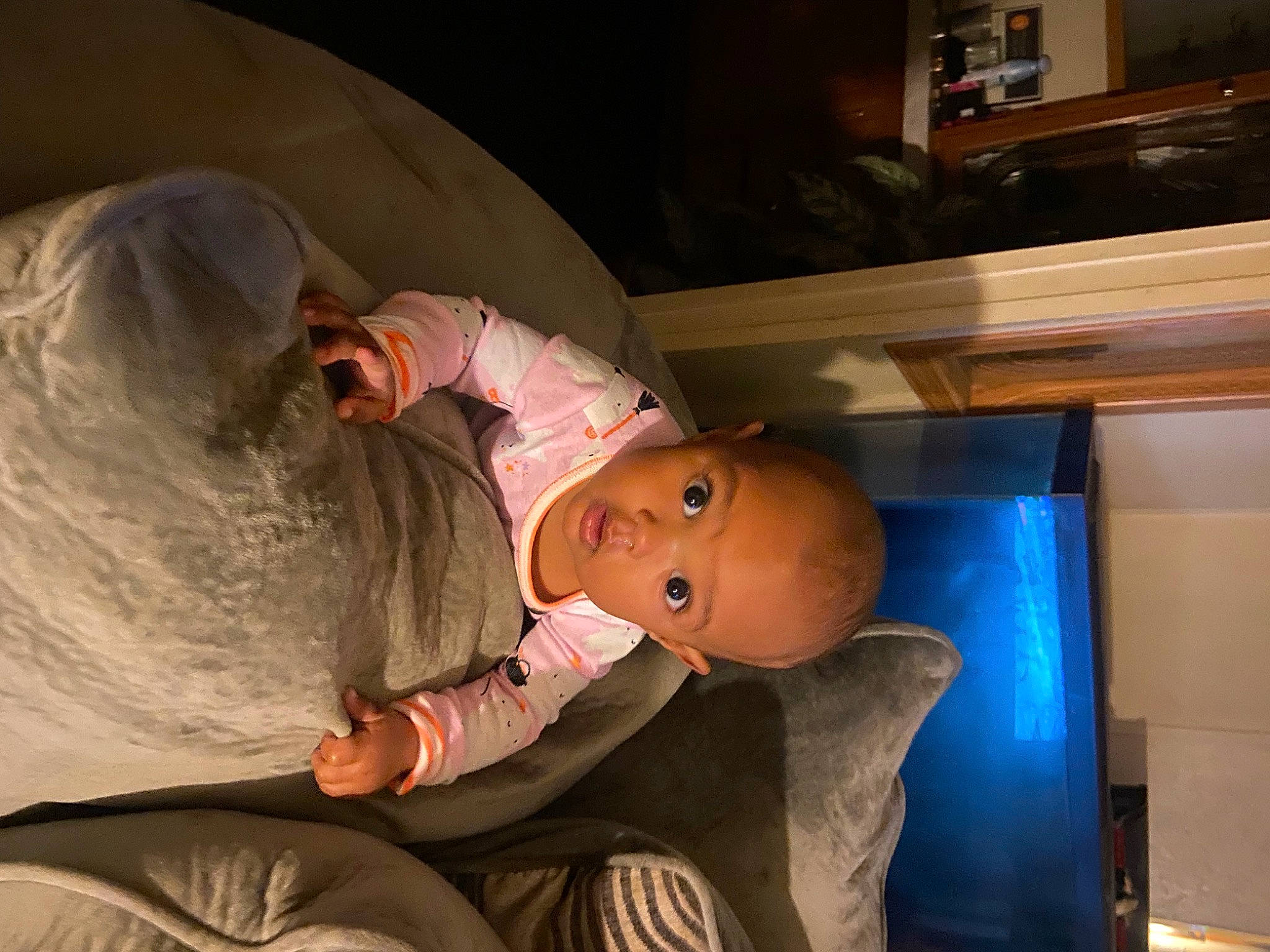 Kimora joined the competition — help win amazing prizes! baby, baby_products, baby_toddler_clothing, bed, child, comfort, fun, hat, person, room, sitting, smile, suit, surprise, toddler, wood