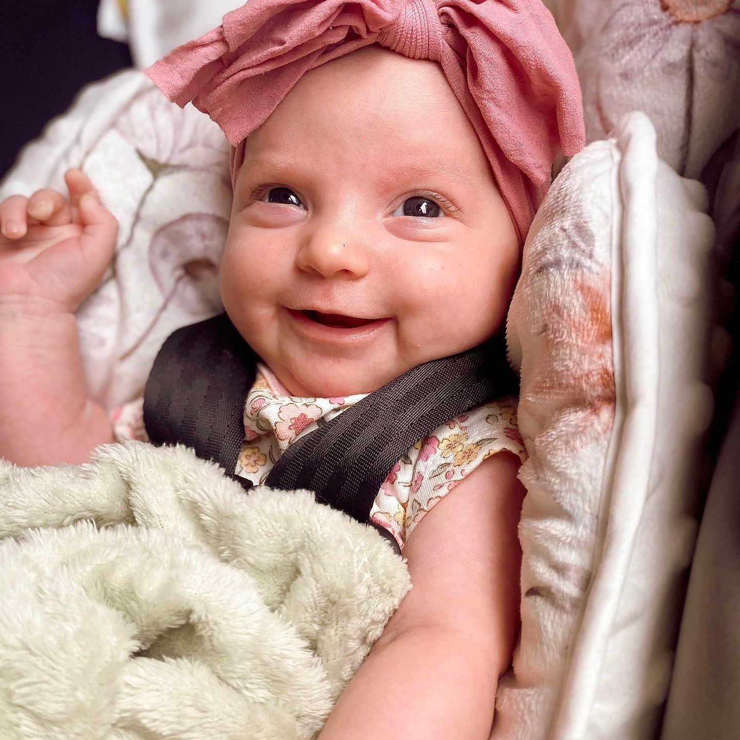 Maci is registered to the contest to win money with this photo: baby, bed, blanket, bodypart, bonnet, clothing, face, finger, furniture, hand, happy, hat, head, homedecor, newborn, person, photography, portrait, quilt, smile