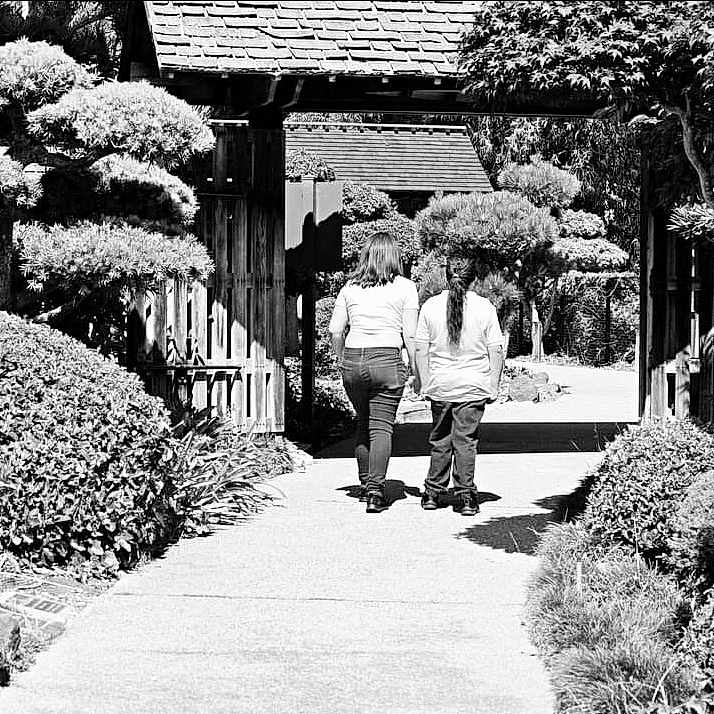 Chase Owen is registered to the contest to win money with this photo: black, black_and_white, botany, garden, grass, landscape, landscaping, leisure, monochrome, monochrome_photography, pedestrian, people_in_nature, plant, road, sidewalk, standing, street, style, tints_and_shades, tree