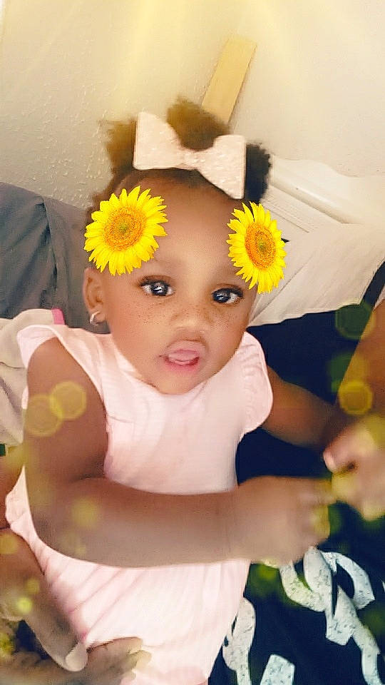 Averiuna is registered to the contest to win money with this photo: baby, child, fashion_accessory, flower, hair_accessory, headband, headgear, person, plant, toddler, yellow