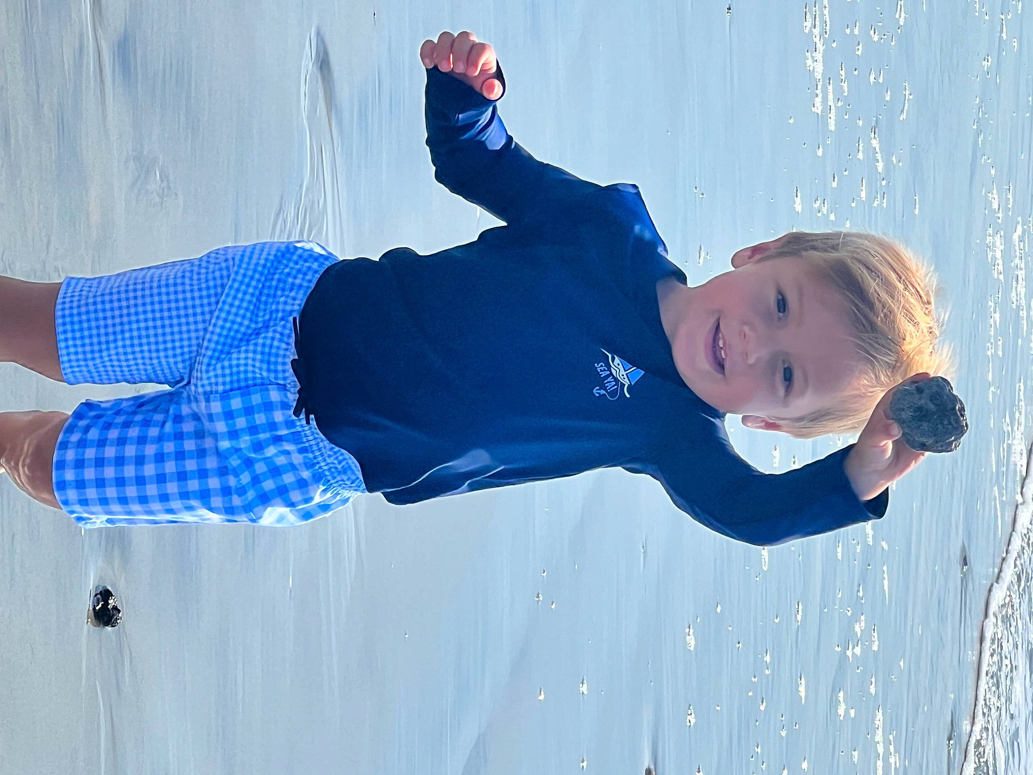 Jamie joined the competition — help win amazing prizes! azure, child, denim, electric_blue, freezing, fun, gesture, happy, joy, leisure, people_in_nature, person, play, recreation, shadow, sky, slope, smile, sportswear, standing