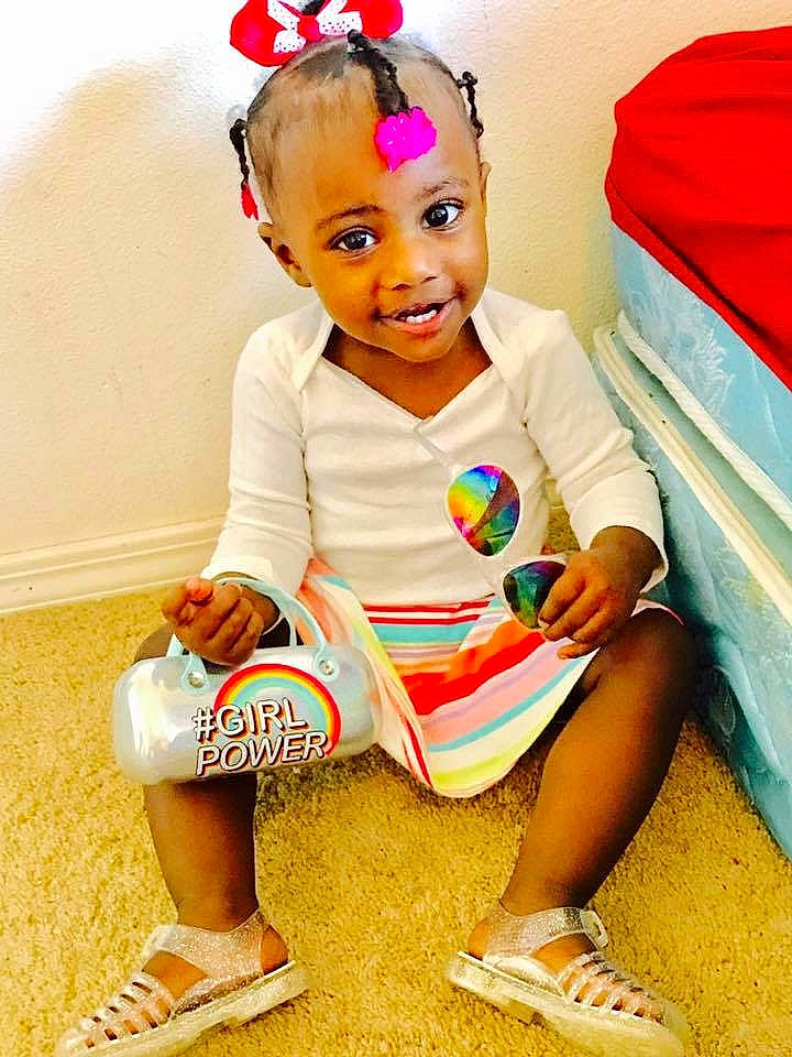 Taniyah joined the competition — help win amazing prizes! baby, baby_toddler_clothing, cheek, child, child_model, ear, footwear, hair_accessory, hairstyle, headband, headgear, joy, lip, person, pink, play, potty_training, product, shoe, sitting