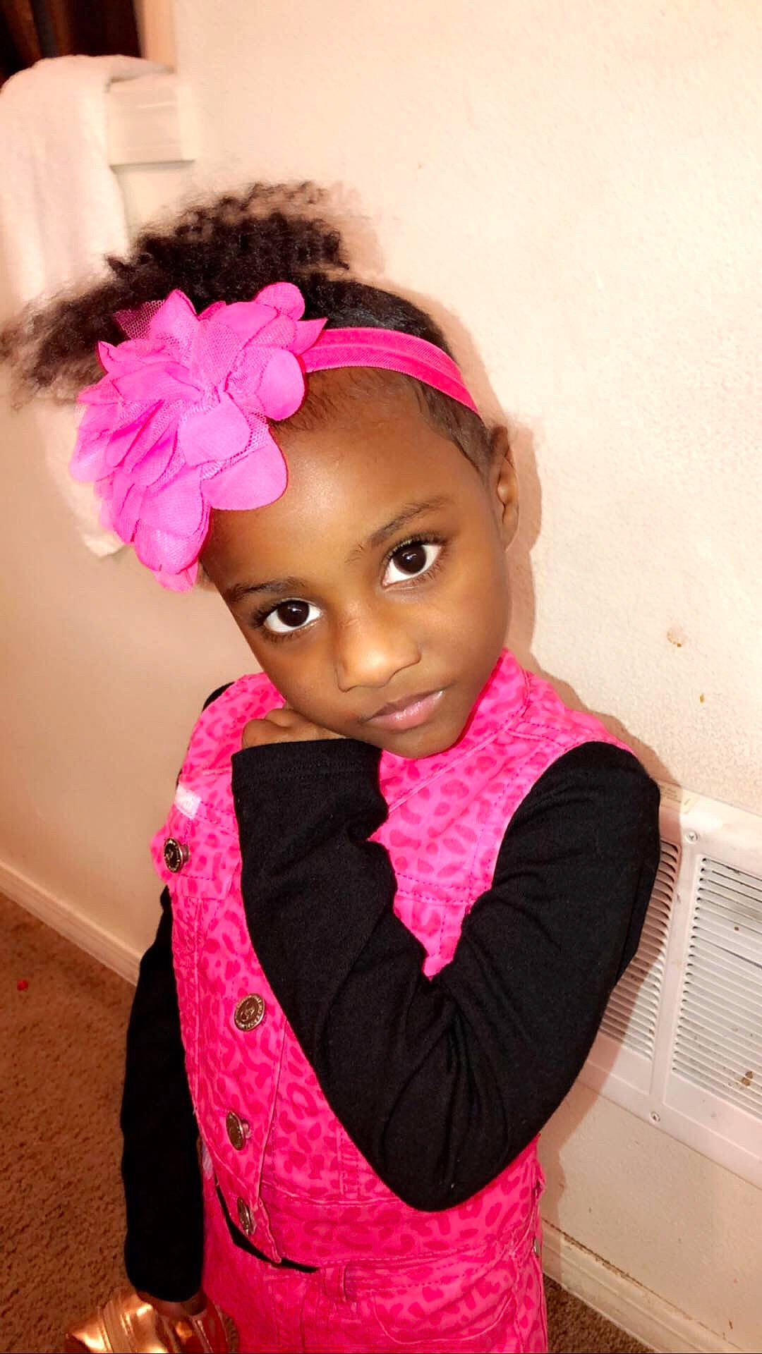 Taniyah is registered to the contest to win money with this photo: child, fashion_accessory, hair, hair_accessory, hairstyle, headband, headgear, magenta, person, pink, toddler