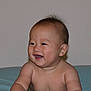 baby, child, smiling, happy, portrait, infant, skin, face, head, bare_shoulders, cute, toddler, human, person, young, indoors, expression, hair, chubby, sitting
