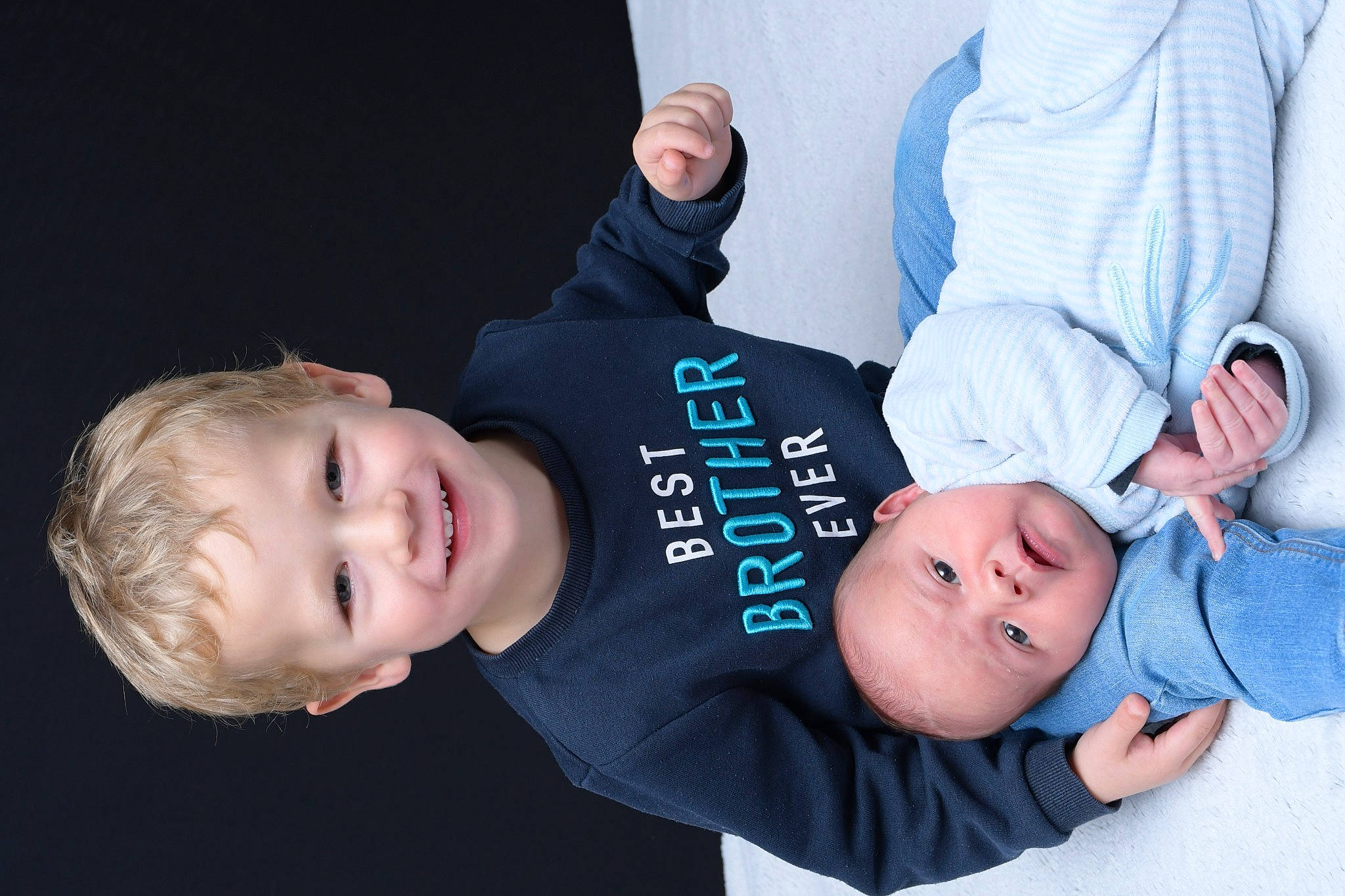 Jordan participe au concours pour gagner de l'argent avec cette photo : arm, baby, baby_products, baby_toddler_clothing, child, comfort, finger, flash_photography, gesture, grass, happy, hat, joy, person, plant, portrait_photography, product, sitting, sleeve, smile
