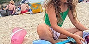 Elena a rejoint le concours — aidez-le/la à gagner de superbes lots ! child, girl, beach, sand, sandcastle, toy_shovel, bucket, umbrella, cloudy_sky, summer, play, vacation, sea, holiday, people, nature, relaxation, outdoor, fun, sand_toys