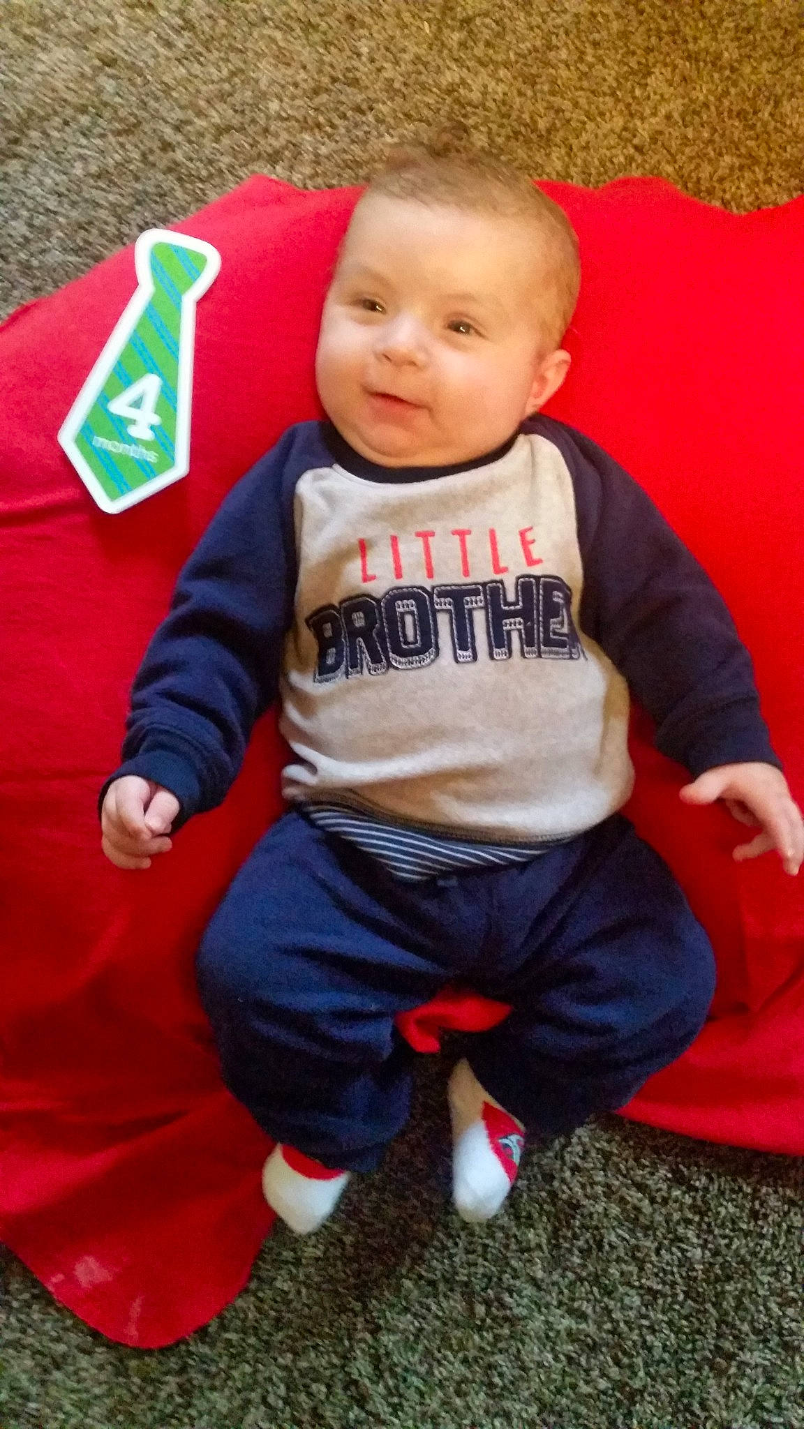 Jakin joined the competition — help win amazing prizes! boy, child, day, fun, infant, lap, outerwear, person, play, product, red, sitting, smile, standing, toddler