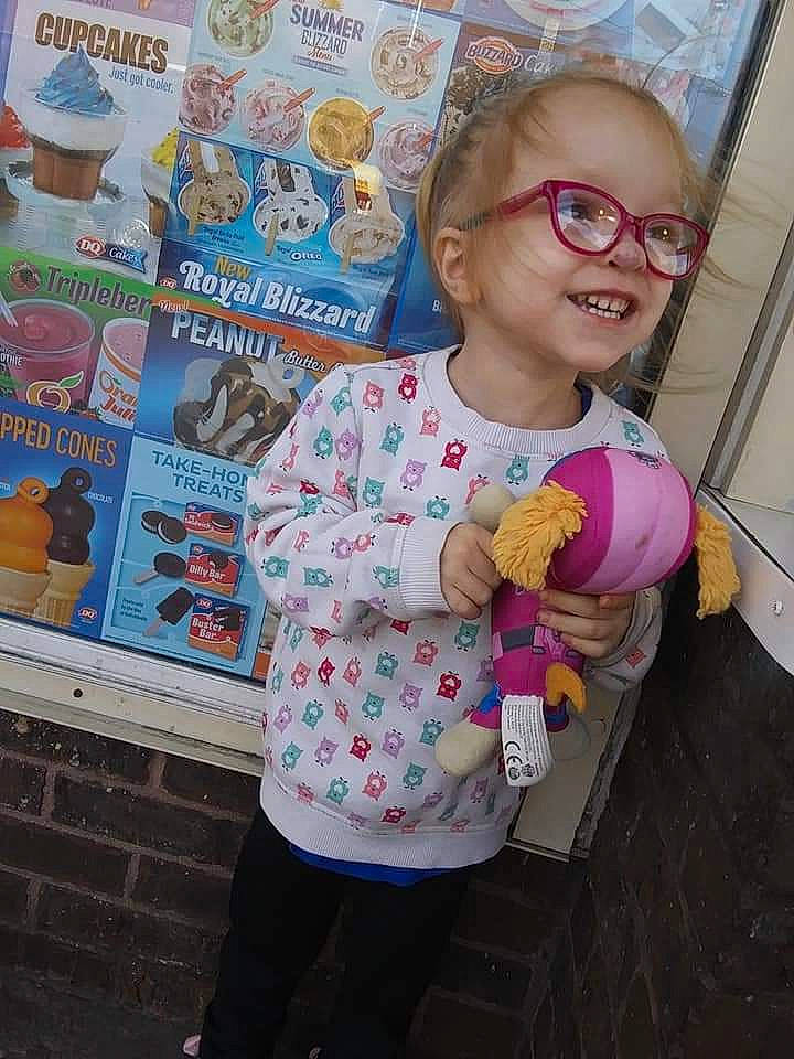 Dalia is registered to the contest to win money with this photo: child, cool, eyewear, fun, glasses, happy, human, joy, magenta, pattern, person, pink, sandal, sleeve, smile, sunglasses, t_shirt, toddler, toy, travel