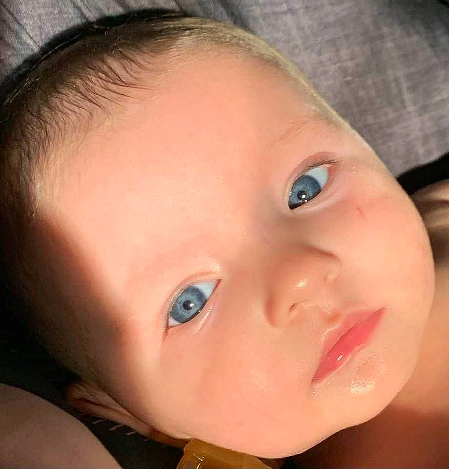 Meadow is registered to the contest to win money with this photo: baby, brown_hair, cheek, child, close_up, ear, eyelash, flash_photography, forehead, happy, iris, jaw, lip, mouth, neck, no_expression, nose, person, skin, smile