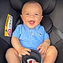 baby, child, car_seat, blue_shirt, smiling, happy, infant, seatbelt, cute, polo_shirt, toes, hands, sitting, interior, safety, car, child_seat, cushion, closeup, portrait