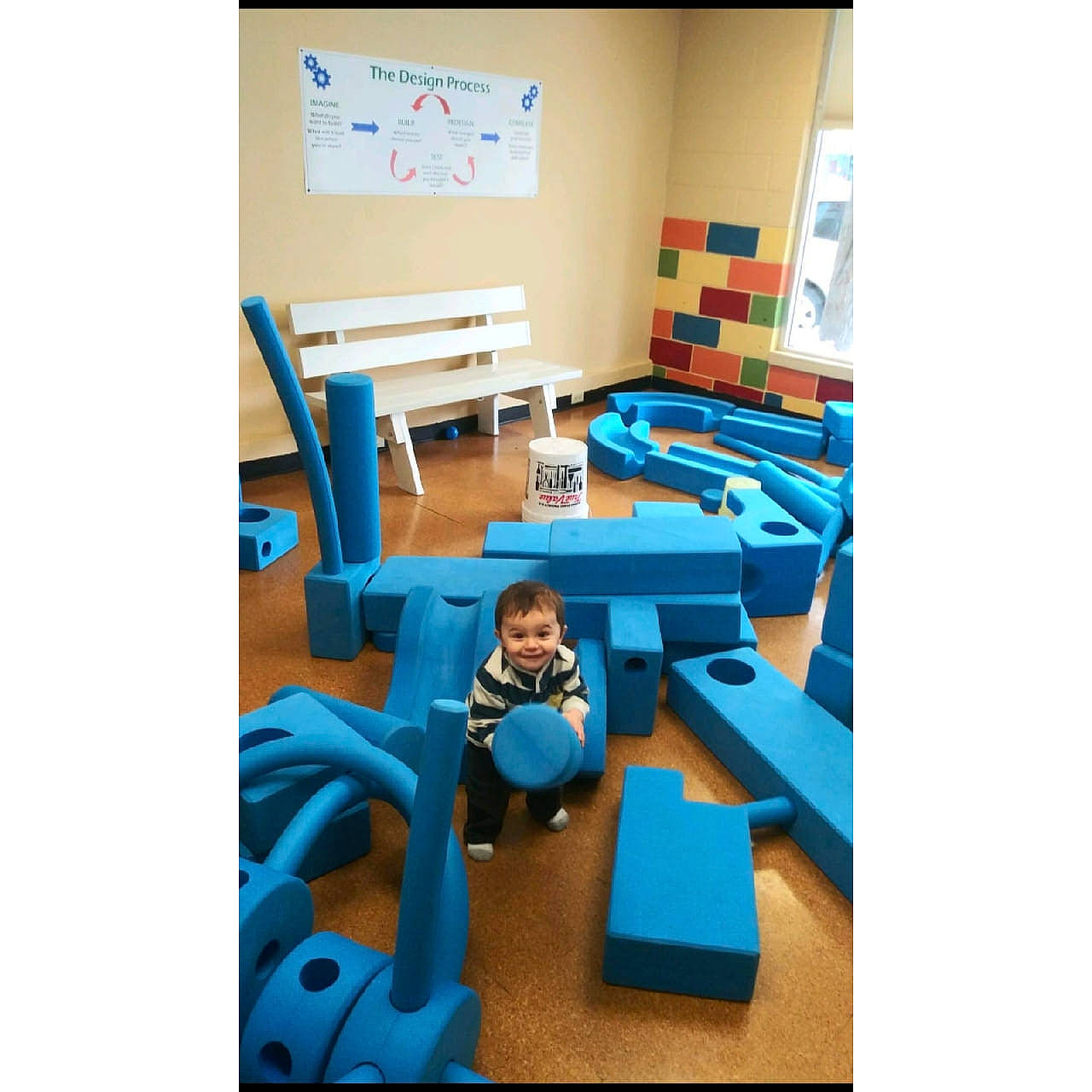 Boston joined the competition — help win amazing prizes! building, child, classroom, floor, furniture, interior_design, joy, learning, person, play, room, table, turquoise