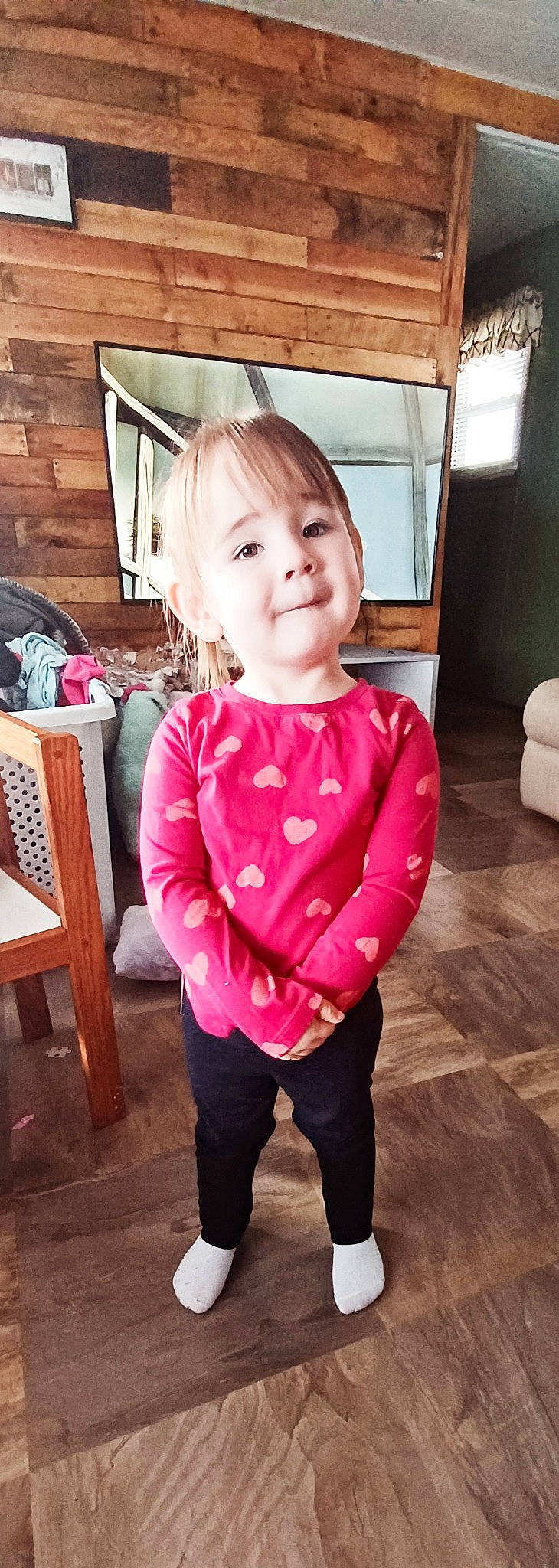 Brayleigh is registered to the contest to win money with this photo: baby_toddler_clothing, cheek, clothing, dress, eye, face, floor, flooring, happy, human_body, joy, magenta, person, pink, shoulder, sleeve, smile, t_shirt, thigh, toddler