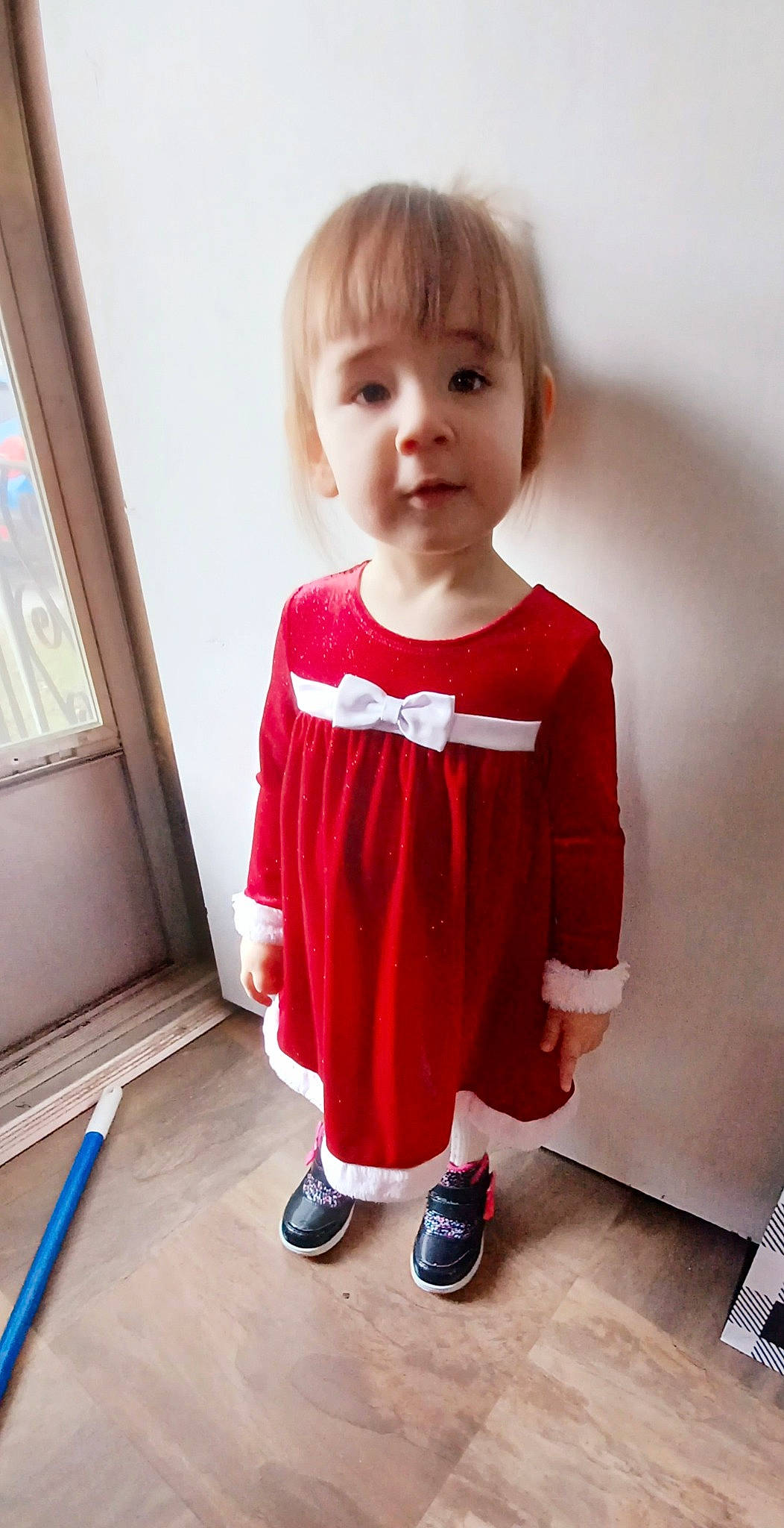 Brayleigh is registered to the contest to win money with this photo: arm, baby, baby_toddler_clothing, child, clothing, dress, flooring, happy, joint, knee, leg, neck, one_piece_garment, outerwear, person, shoe, shoulder, sleeve, sneakers, t_shirt