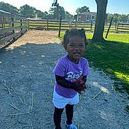 Indie joined the competition — help win amazing prizes! child, clothing, face, female, footwear, grass, head, nature, outdoors, park, person, photography, plant, portrait, shoe, shorts, soil, t_shirt, tree, vegetation