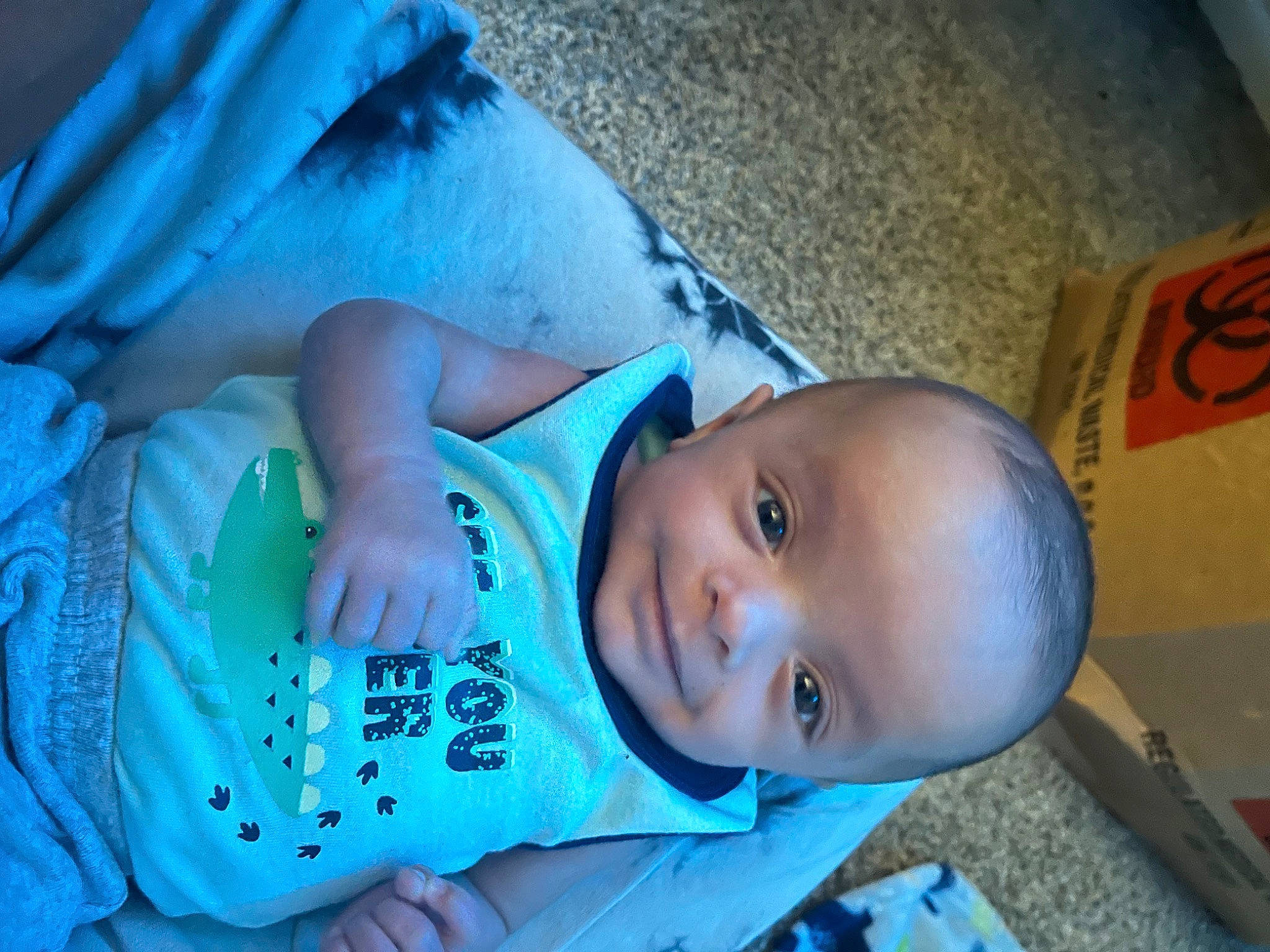 Jasiah is registered to the contest to win money with this photo: azure, baby, baby_products, baby_toddler_clothing, blue, cheek, child, electric_blue, eye, fun, happy, human, mouth, nose, person, skin, smile, toddler, tree, water