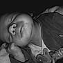 Soan a rejoint le concours — aidez-le/la à gagner de superbes lots ! baby, sleeping, pacifier, close_up, black_and_white, infant, peaceful, face, hand, clothing, blanket, newborn, rest, portrait, soft_lighting, indoors, cute, child, relaxation, still_life