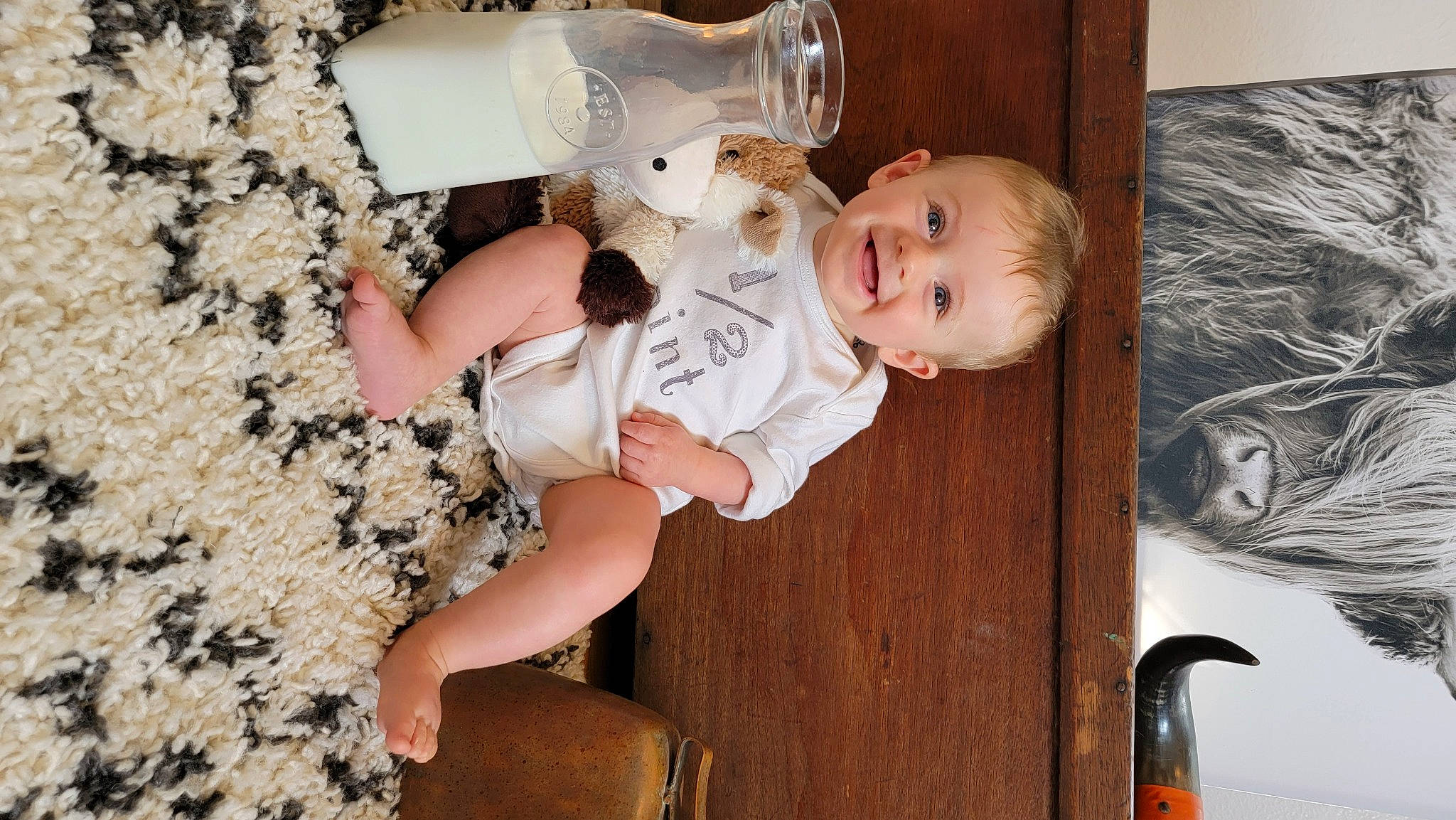 Boaz joined the competition — help win amazing prizes! arm, baby, baby_toddler_clothing, cheek, child, drinkware, facial_expression, finger, fun, hand, happy, hardwood, joy, person, room, sitting, skin, smile, toddler, toy