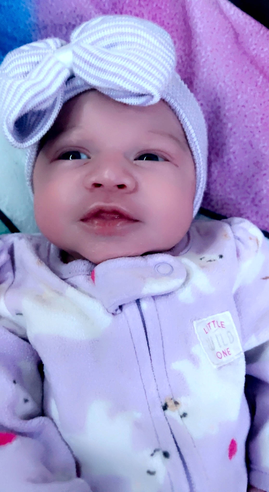 Dream is registered to the contest to win money with this photo: baby, baby_products, baby_toddler_clothing, cap, cheek, child, collar, fashion_accessory, happy, headgear, headwear, lip, person, photograph, pink, purple, skin, sleeve, smile, toddler