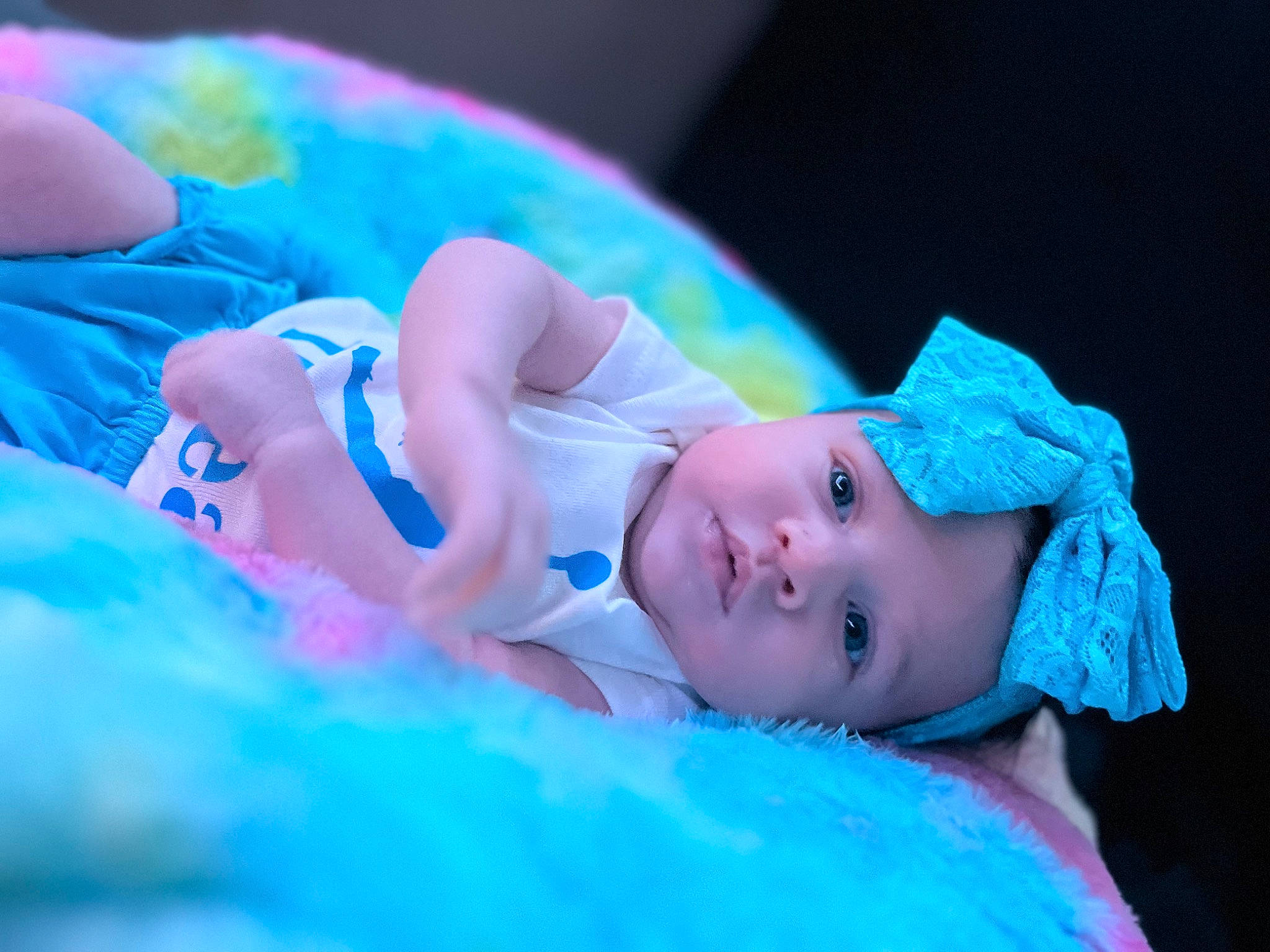 Dream is registered to the contest to win money with this photo: baby, bedtime, child, darkness, electric_blue, event, eye, fashion_accessory, flash_photography, fun, grass, happy, headwear, leisure, magenta, person, purple, room, sitting, skin