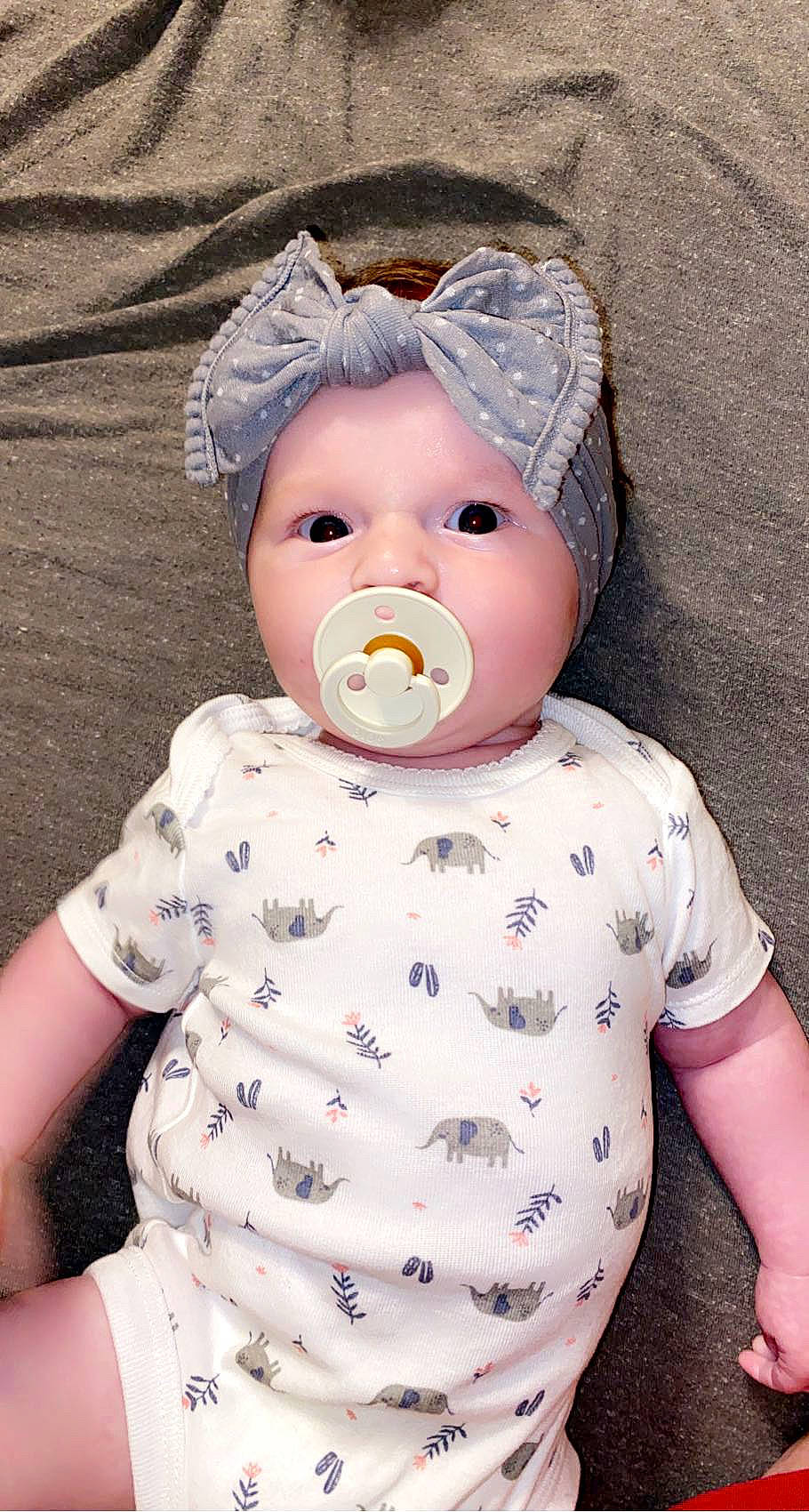 Kaisley Ann is registered to the contest to win money with this photo: baby, baby_toddler_clothing, cap, cheek, child, clothing, collar, eye, head, headwear, lip, nose, outerwear, pattern, person, pink, product, sleeve, textile, toddler