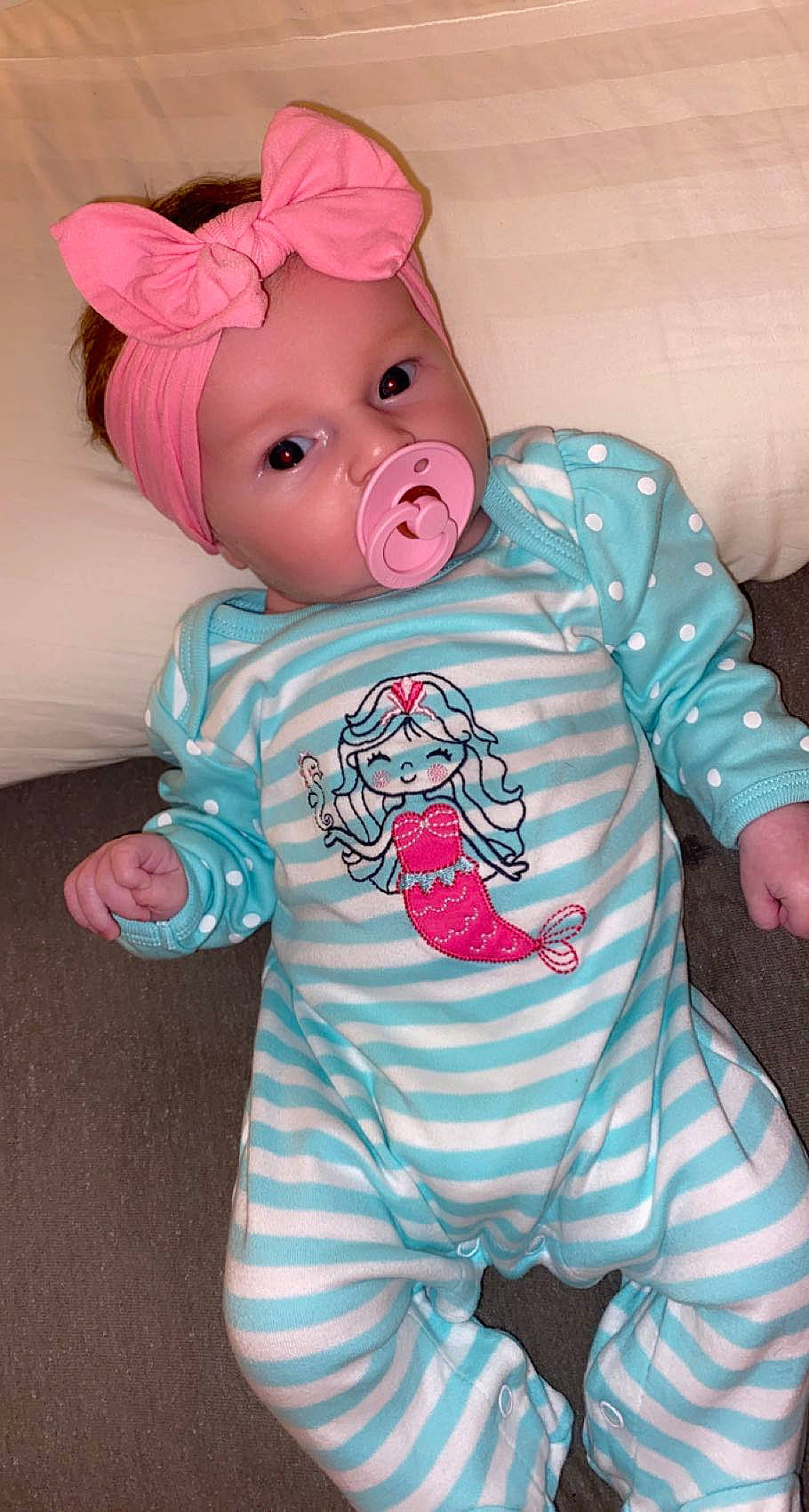 Kaisley Ann is registered to the contest to win money with this photo: baby, baby_toddler_clothing, cheek, child, eye, face, happy, head, headwear, joint, mammal, organ, outerwear, person, pink, skin, sleeve, t_shirt, textile, toddler