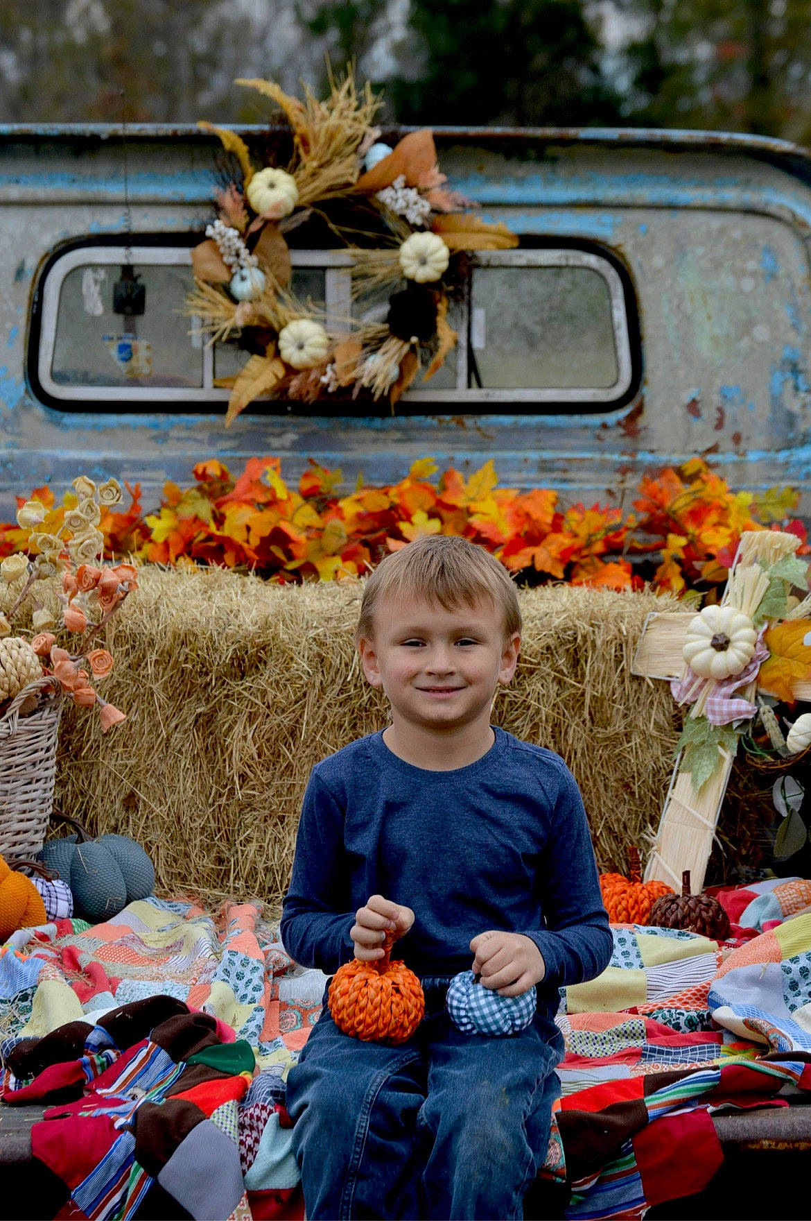 Greysen joined the competition — help win amazing prizes! child, daytime, event, fun, happy, jeans, joy, leaf, leisure, market, motor_vehicle, orange, people, person, plant, pumpkin, sitting, t_shirt, toddler, toy