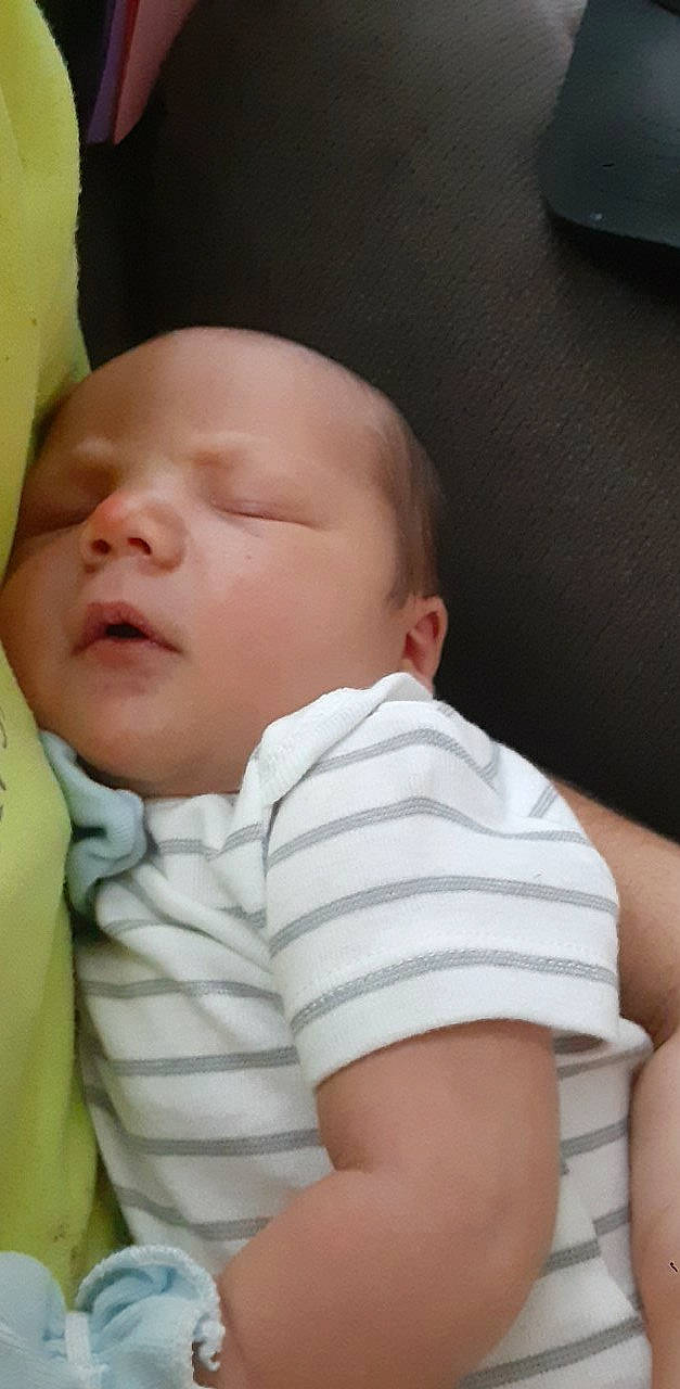 Caysen is registered to the contest to win money with this photo: baby, baby_toddler_clothing, bedtime, cheek, child, chin, close_up, comfort, eye, eyebrow, eyelash, face, iris, lip, mouth, neck, nose, person, skin, sleeve