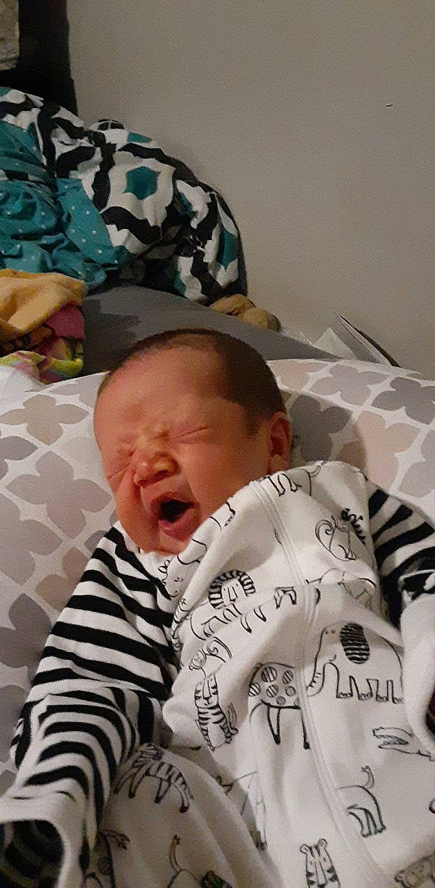 Caysen is registered to the contest to win money with this photo: baby, baby_products, baby_toddler_clothing, bed, bedding, bedtime, cheek, child, comfort, event, eye, happy, linens, mouth, nap, nose, pattern, person, room, textile