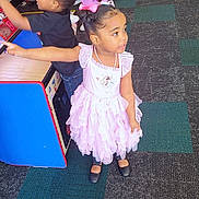 Eliana is registered to the contest to win money with this photo: arcadegamemachine, boy, child, clothing, dress, face, female, footwear, game, girl, head, indoors, kindergarten, male, person, photography, playarea, portrait, sandal, skirt