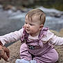 Ivory joined the competition — help win amazing prizes! baby, child, pink_overalls, minnie_mouse, outdoor, rock, holding_hand, tattoo, cute, infant, sitting, nature, water, soft_focus, clothing, person, smiling, light_skin, expression, portrait
