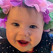 Ivory joined the competition — help win amazing prizes! baby, child, face, smiling, flower_crown, polka_dot, clothing, indoor, portrait, cute, headwear, closeup, young_child, happy, person, infant, cheerful, apparel, nature_background, indoors
