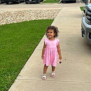 Isabella joined the competition — help win amazing prizes! child, girl, pink_dress, sunglasses, sidewalk, grass, cars, parking_lot, smiling, curly_hair, sandals, outdoor, daytime, happy, person, concrete, urban, casual, cute, playful