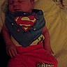 Odin joined the competition — help win amazing prizes! newborn, baby, infant, sleeping, superman, superhero, red_outfit, blanket, portrait, face, closed_eyes, indoors, cozy, textile, clothing, costume, lying_down, peaceful, photograph, low_light