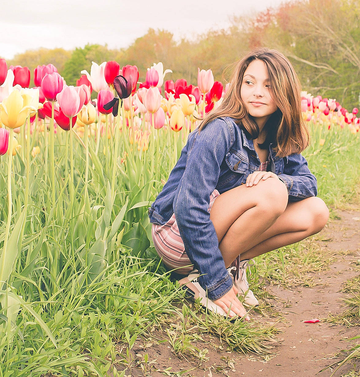 Anna-lei is registered to the contest to win money with this photo: beauty, botany, flash_photography, flower, grass, grass_family, grassland, happy, knee, landscape, leaf, leg, leisure, meadow, natural_landscape, people_in_nature, person, petal, plant, street_fashion