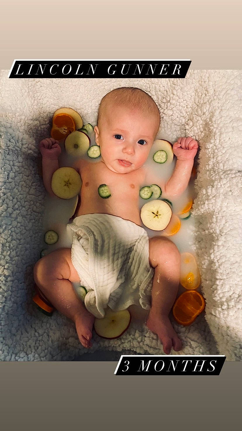 Lincoln is registered to the contest to win money with this photo: adaptation, advertising, apple, art, baby, child, fictional_character, font, happy, natural_foods, organism, person, photo_caption, publication, still_life_photography, stock_photography