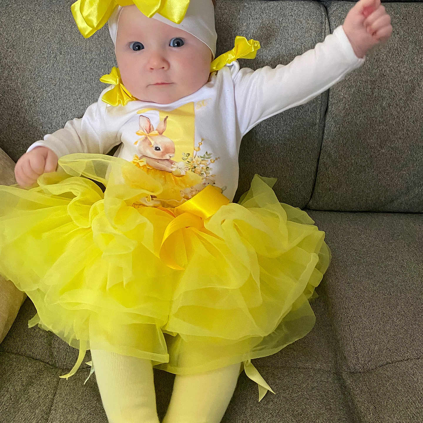 Francesca is registered to the contest to win money with this photo: baby, clothing, costume, couch, dress, face, flower, flowerarrangement, flowerbouquet, formalwear, furniture, hat, head, people, person, photography, plant, portrait, sitting, toy