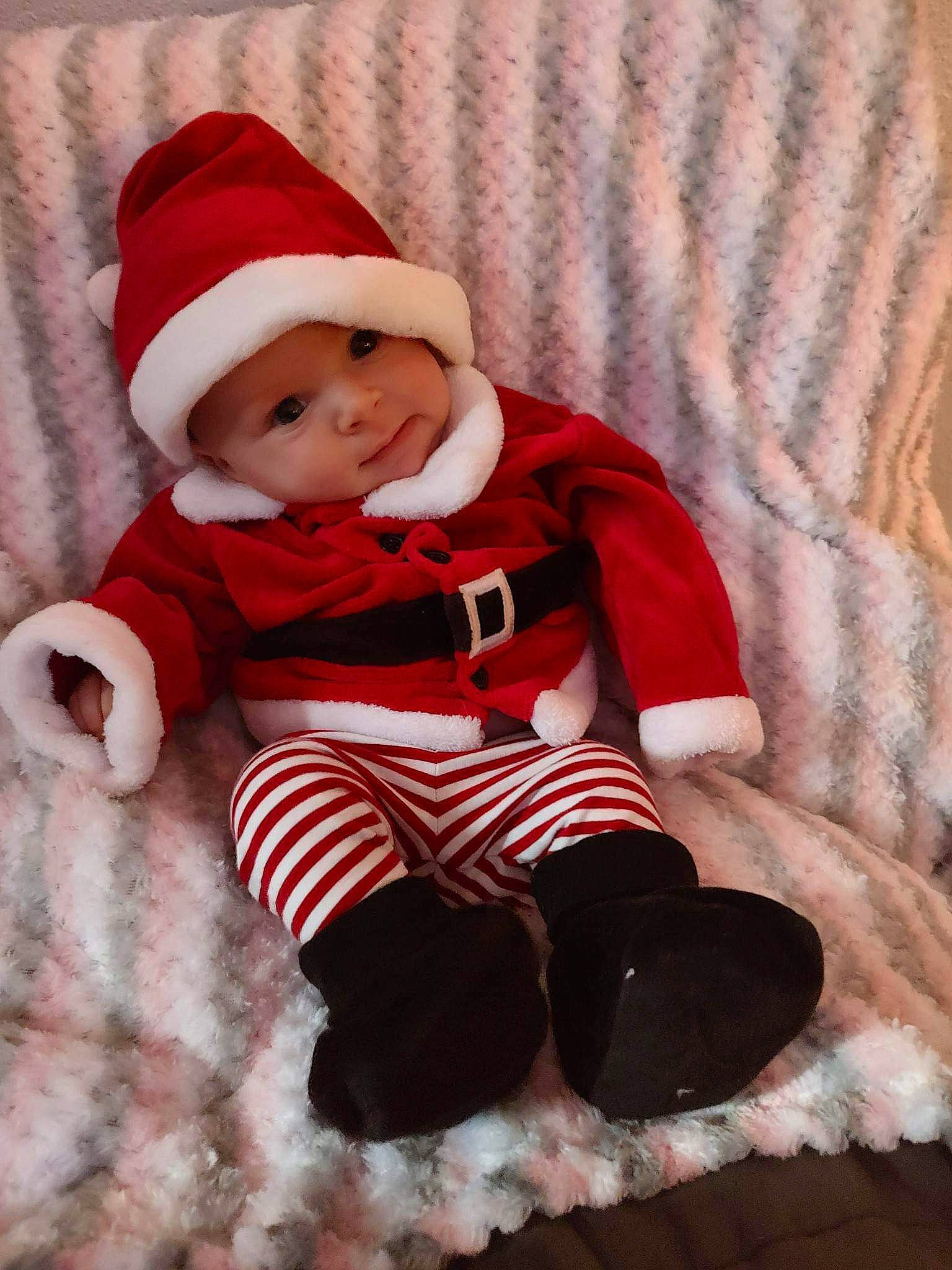 Hadley joined the competition — help win amazing prizes! baby, baby_sleeping, baby_toddler_clothing, cap, child, comfort, costume_hat, fictional_character, fur, hat, headwear, human_body, knit_cap, linens, pattern, person, sleeve, sock, textile, toddler