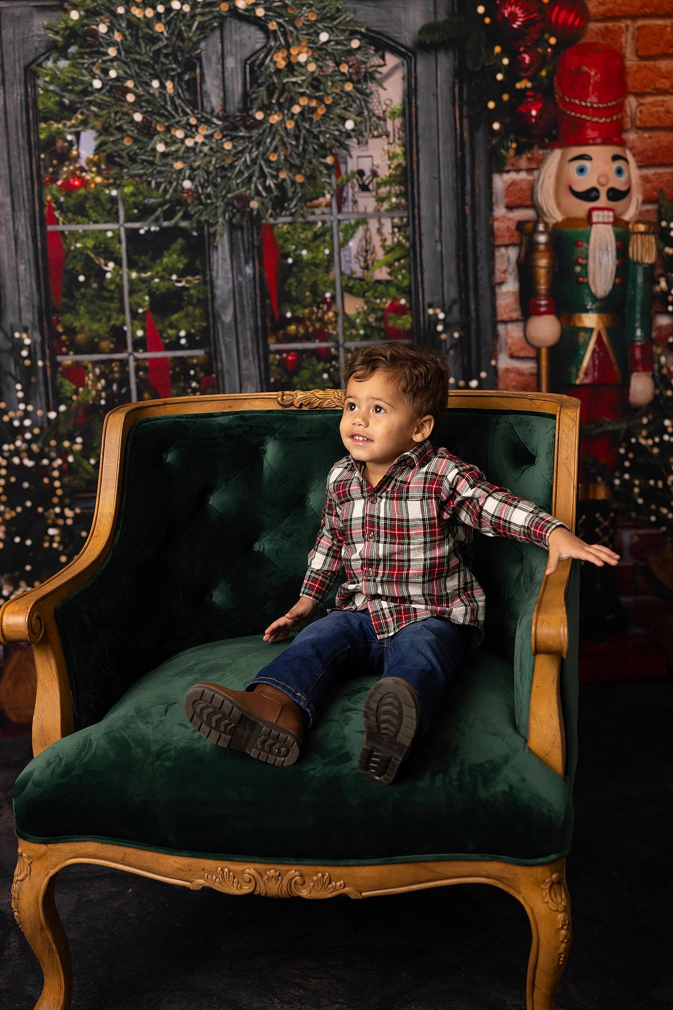 Ayden joined the competition — help win amazing prizes! chair, child, christmas_decoration, christmas_ornament, city, event, fun, head, holiday_ornament, leisure, lighting, ornament, pattern, person, plaid, public_space, sitting, standing, tartan, tree