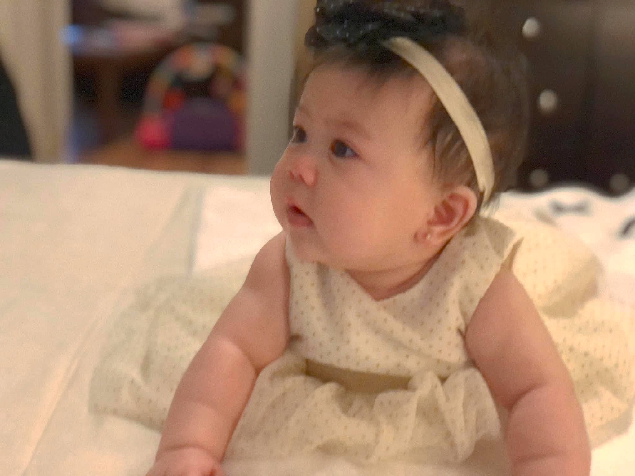 Annalise joined the competition — help win amazing prizes! baby, baby_toddler_clothing, cheek, chin, comfort, dress, ear, eyebrow, face, facial_expression, happy, iris, lip, mouth, neck, nose, person, skin, sleeve, smile